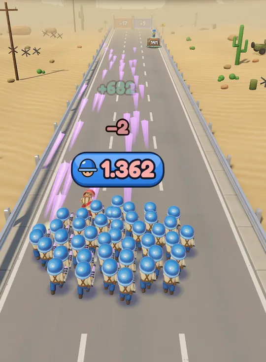 Un escuadrón de más de mil soldados de casco azul corre por una carretera del desierto